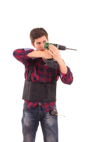 Man with electric drill on a white background, handyman — Stock Photo, Image