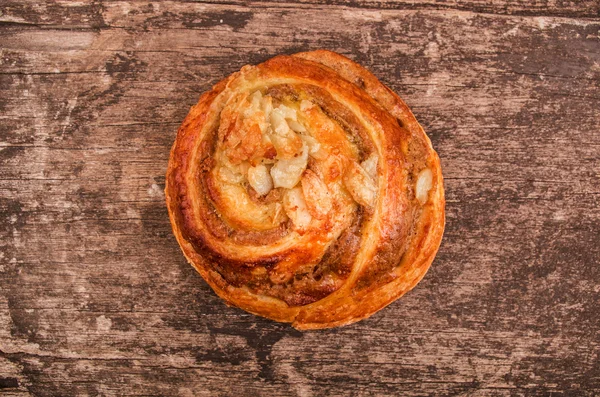 Fresh baked bread on wood table — Stock Photo, Image