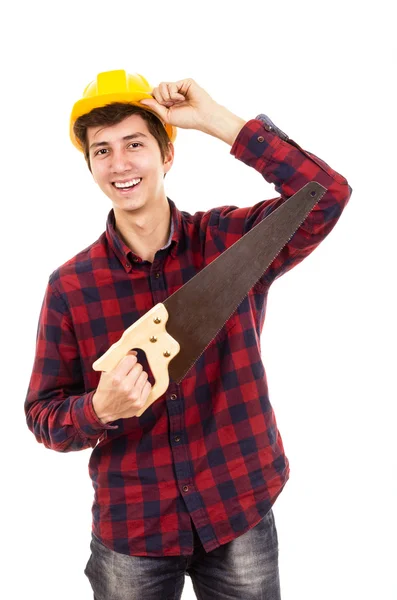 Hombre con una sierra sobre un fondo blanco — Foto de Stock