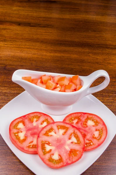 Tomato ready to serve on a plate — Stock Photo, Image