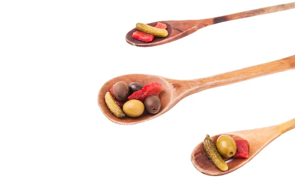 Wood spoons and vegetables on white — Stock Photo, Image