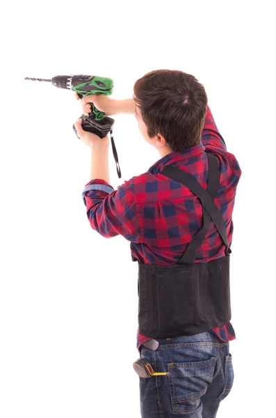Man with electric drill on a white background, handyman — Stock Photo, Image