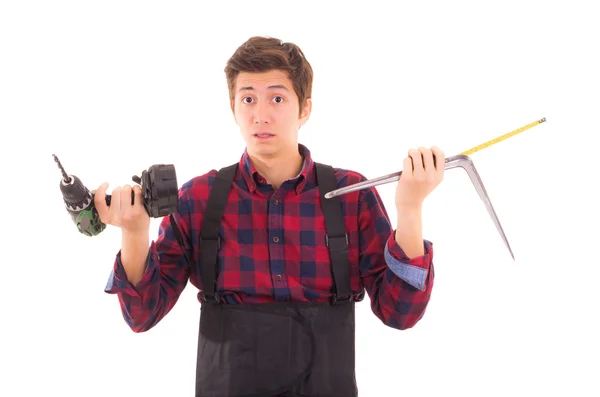 Clueless man with powertools — Stock Photo, Image