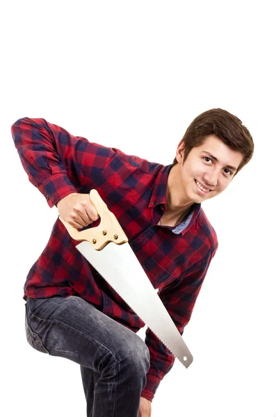 Homem com uma serra em um fundo branco — Fotografia de Stock