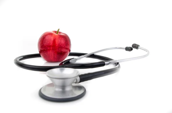 Stetoscopio con una mela — Foto Stock