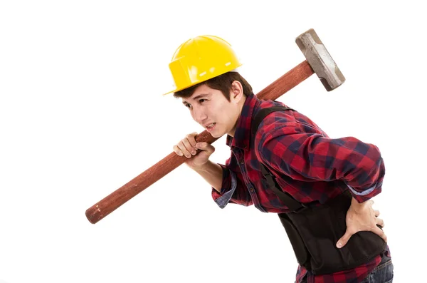 Man with a sledgehammer and a hard hat Royalty Free Stock Images