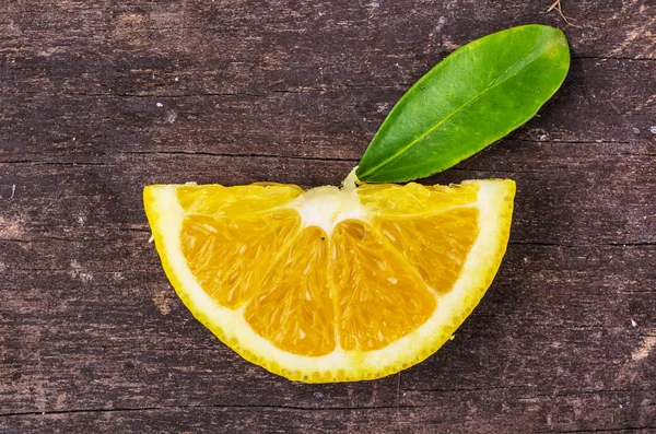 Juicy orange cut in slice — Stock Photo, Image