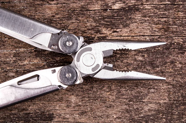 Multitool, utensile multiuso con intonaci e coltello — Foto Stock