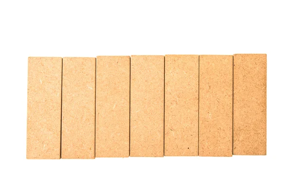 Jenga pieces on a row on a white background — Stock Photo, Image
