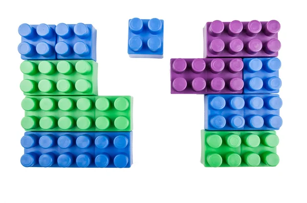 Building blocks  pieces joining on a white background — Stock Photo, Image