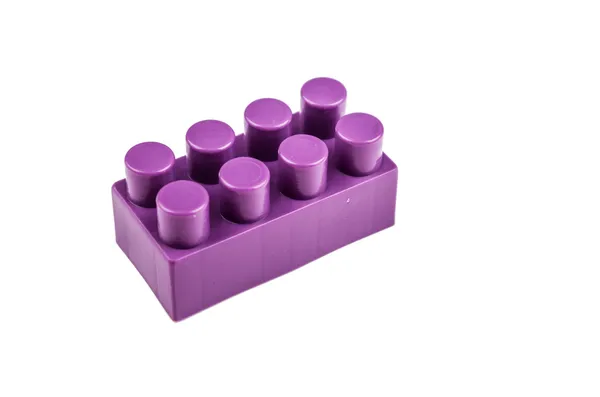 Bloques de construcción púrpura sobre un fondo blanco —  Fotos de Stock