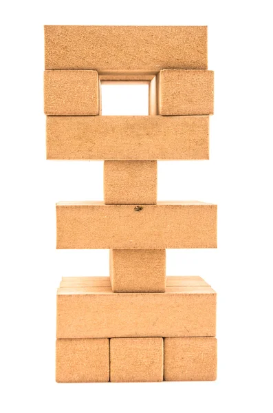 Torre de Jenga com peças em falta em um fundo branco — Fotografia de Stock