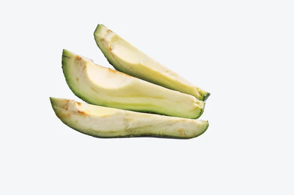 Avocatto na białym tle organiczny plastry — Zdjęcie stockowe