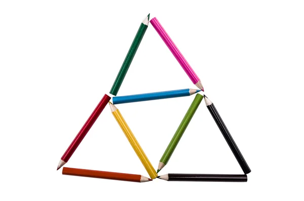 Triángulos de colores lápiz sobre un fondo blanco —  Fotos de Stock