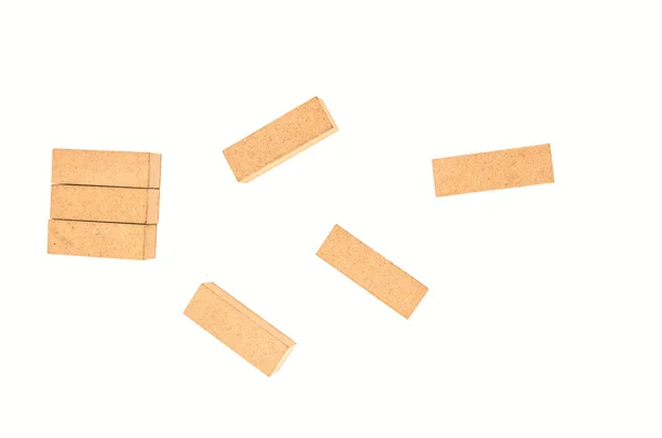 Jenga tornet colapsing på vit bakgrund — Stockfoto