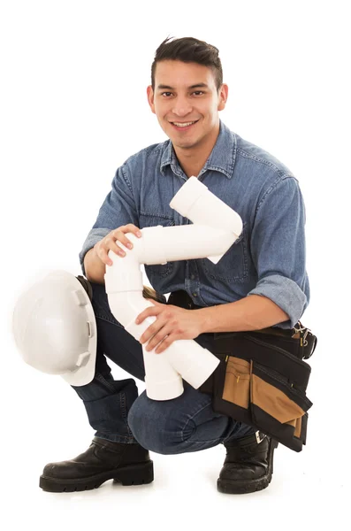 Trabajador de la construcción con tuberías de plomería —  Fotos de Stock