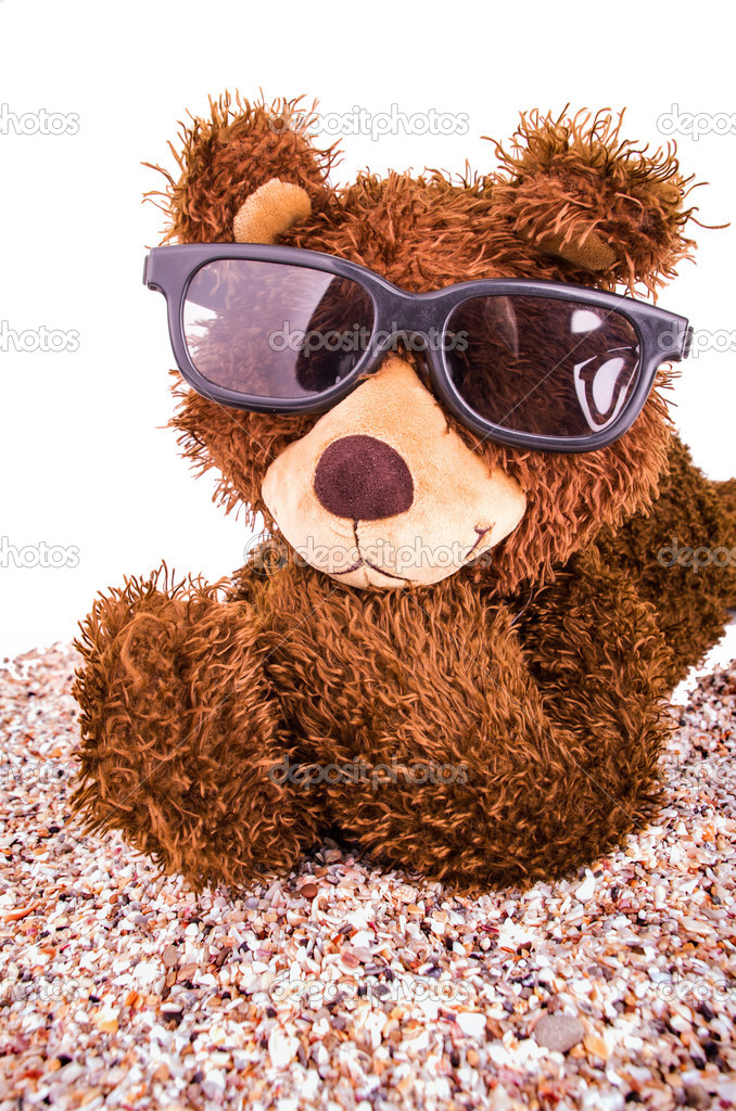 brown teddy bear with sunglasses