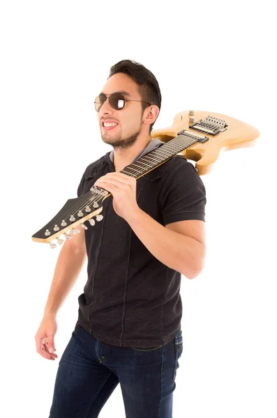 Hispânico jovem segurando guitarra elétrica — Fotografia de Stock