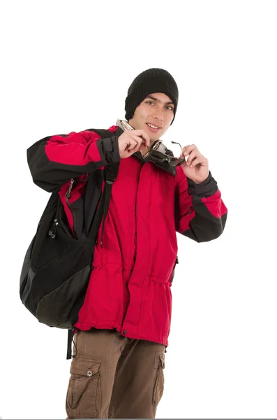 Young man wearing red winter coat posing with sunglasses — Stock Photo, Image