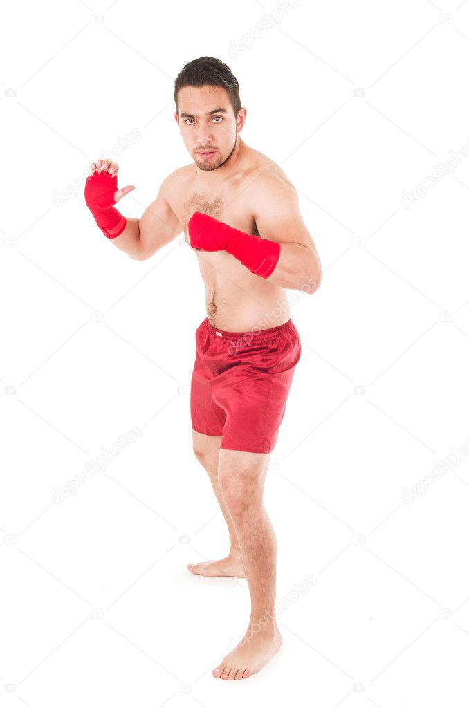 martial arts fighter wearing red shorts and wristband