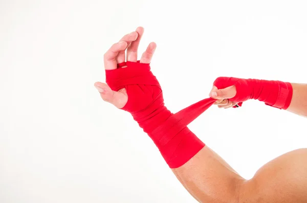 Boxare arm med röda armband runt den — Stockfoto