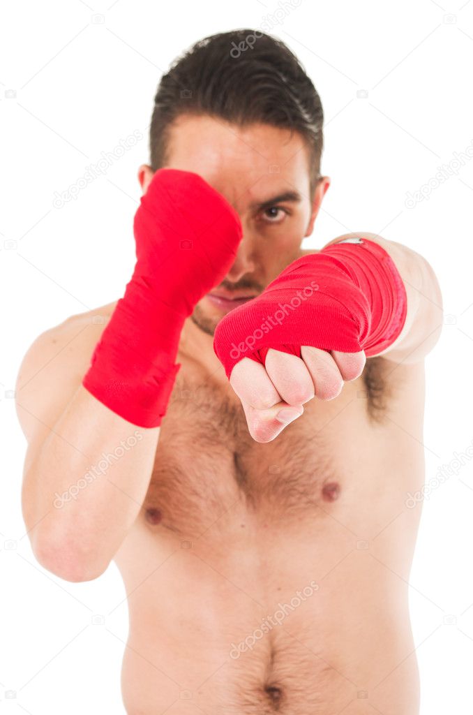 martial arts fighter wearing red shorts and wristband