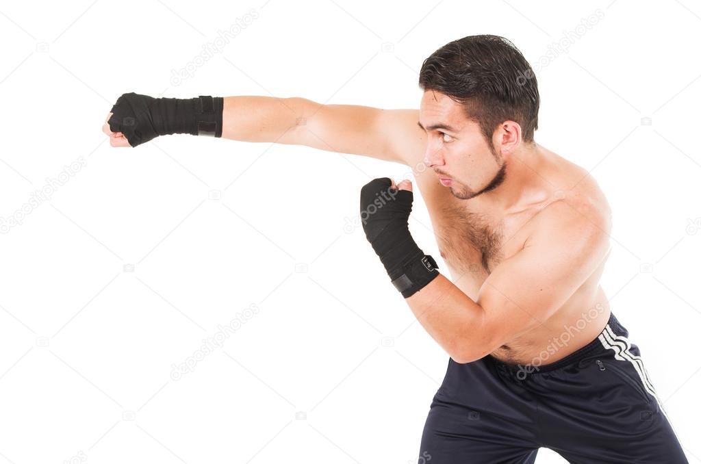 muscular martial arts fighter attacking