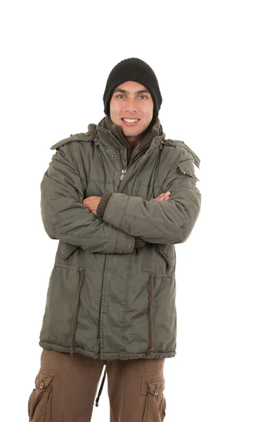 Joven latino vistiendo abrigo de invierno verde y un gorro —  Fotos de Stock