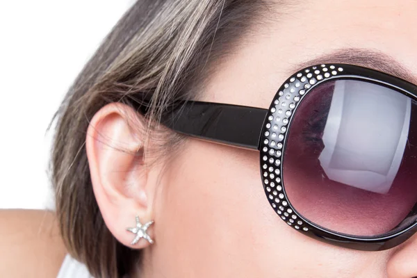 Closeup of sunglasses in girls face — Stock Photo, Image