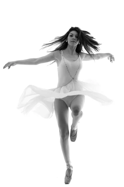 Graceful ballerina dancing en pointe — Stock Photo, Image