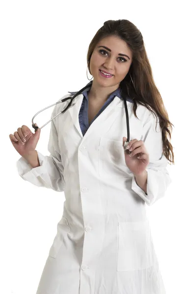 Joven hermosa amable médico femenino con un estetoscopio — Foto de Stock