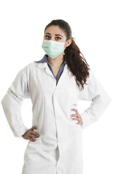 Young beautiful female doctor wearing a mask — Stock Photo, Image