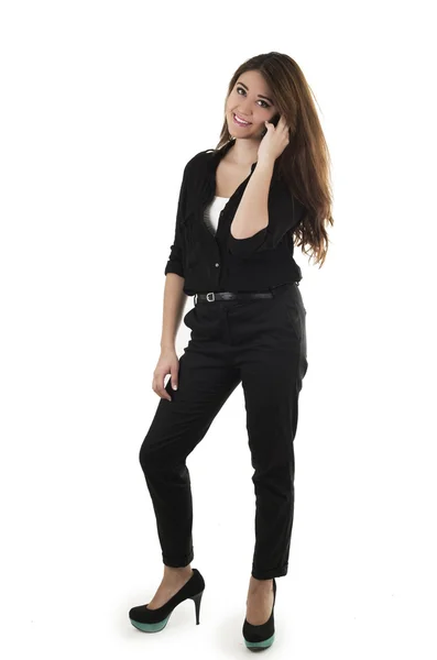 Pretty young brunette girl dressed in black posing — Stock Photo, Image