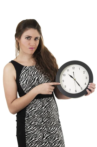 Beautiful young woman holding big round clock — Stock Photo, Image