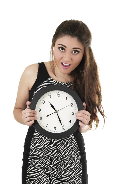 Pretty young hispanic girl holding black round clock — Stock Photo, Image