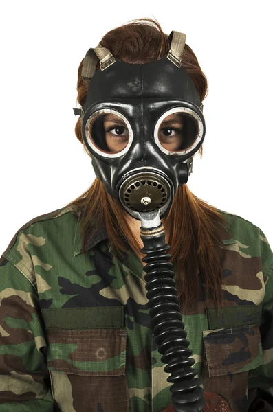 Young military woman wearing gas mask — Stock Photo, Image