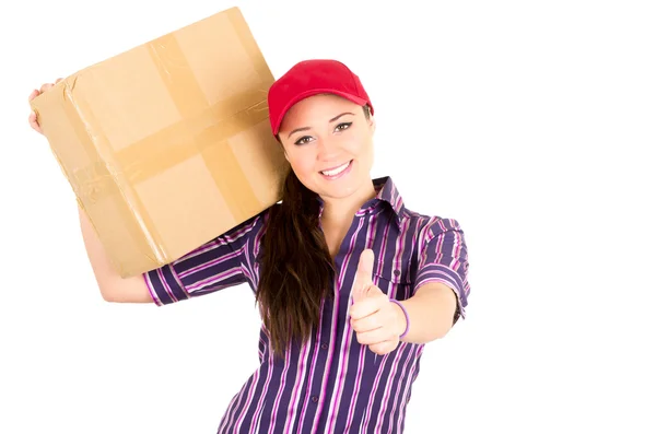 Young happy beautiful delivery girl carrying cardboard box — Stock Photo, Image