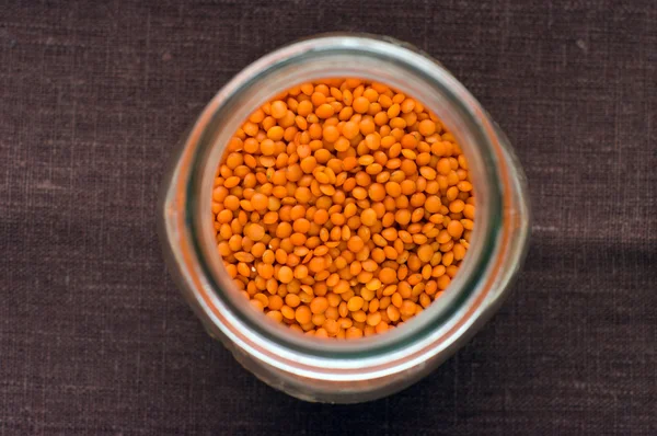 Red lentils in a jar — Stock Photo, Image