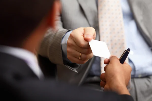 Exchanging the business cards — Stock Photo, Image