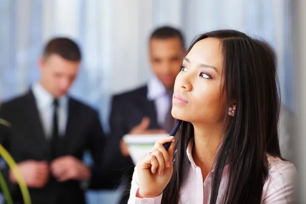 Pensive asian woman — Stock Photo, Image