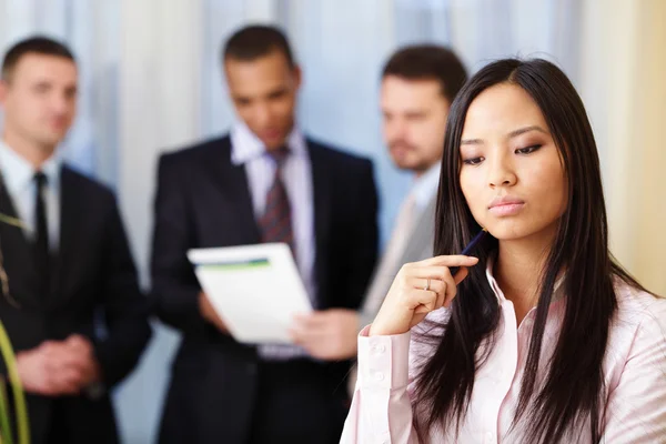 Portrait of young pensive asian woman — Stock Photo, Image