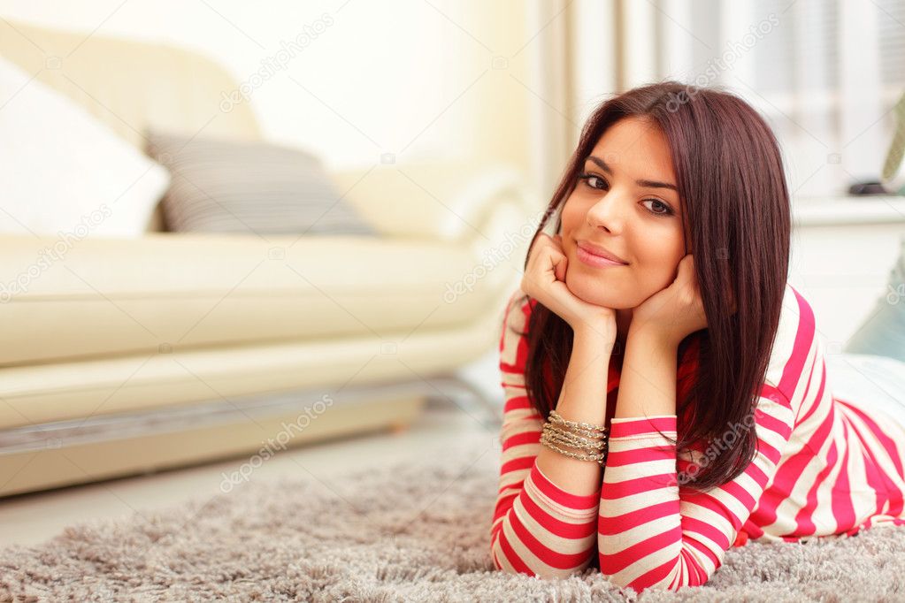 Young beautiful woman at home