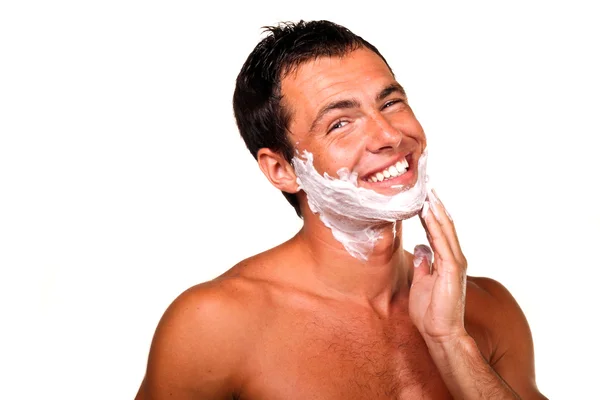 Young handsome man shaving — Stock Photo, Image