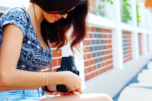 Young beautiful woman with retro camera — Stock Photo, Image