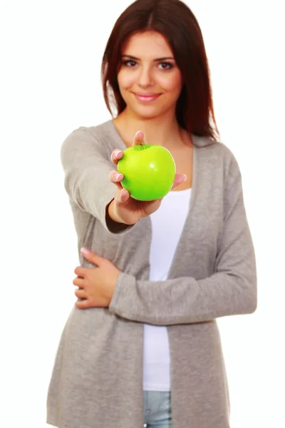 Happy woman giving you an apple — Stock Photo, Image