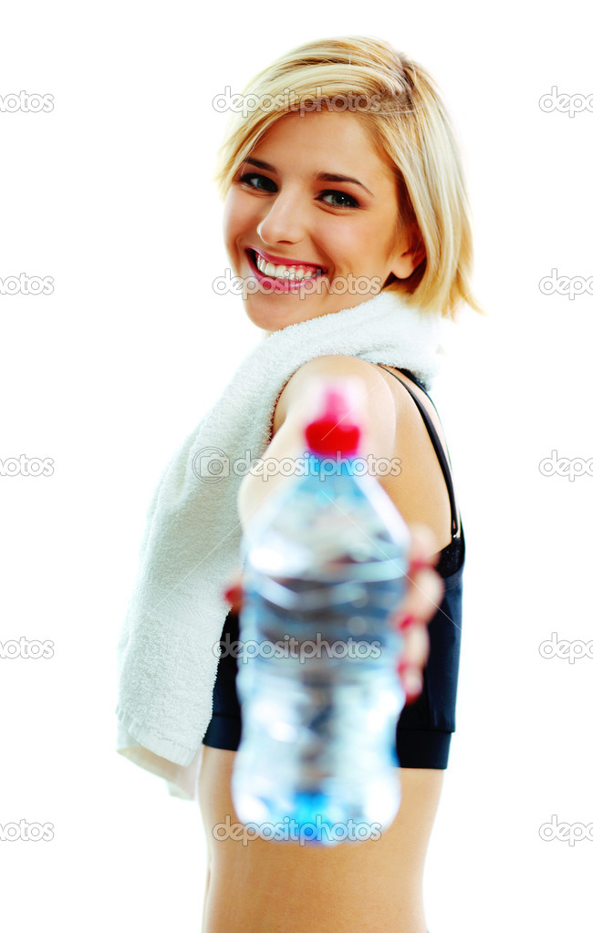 Woman passing a bottle of water to you