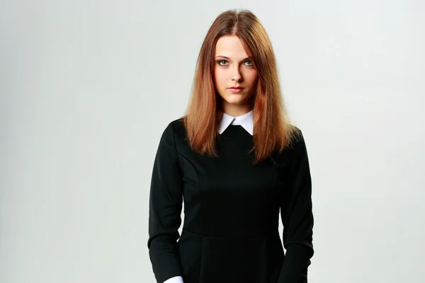 Young thoughtful woman in formal dress — Stock Photo, Image