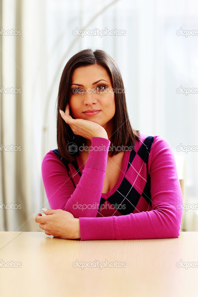 Middle-aged thoughtful woman