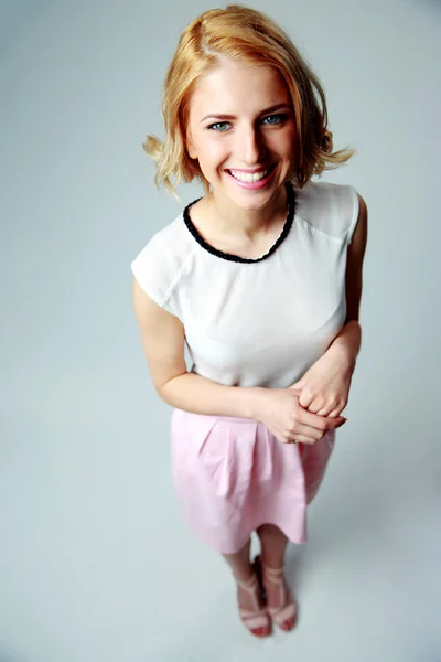 Young beautiful woman in office — Stock Photo, Image