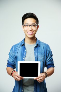Young handsome asian man in glasses clipart